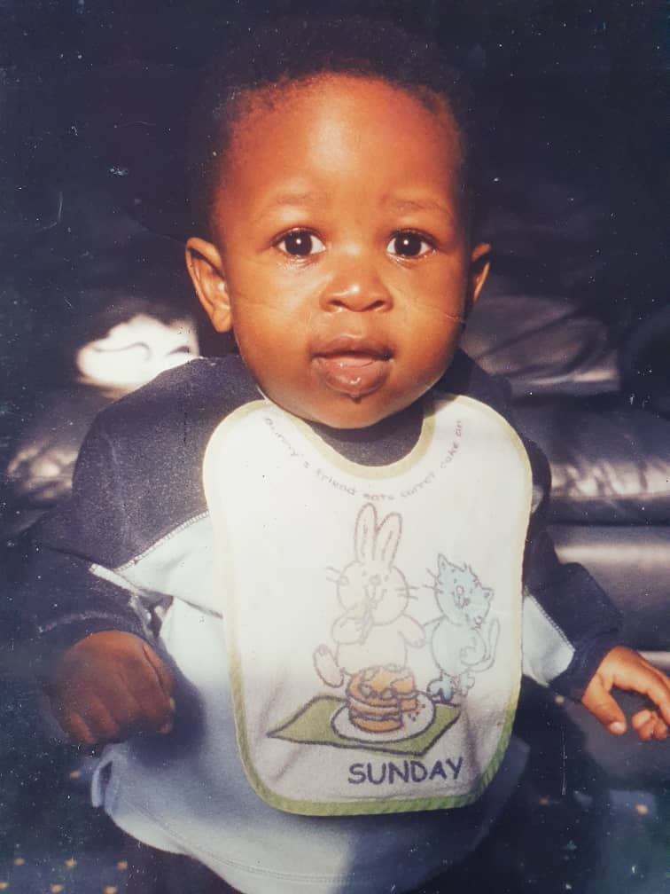 Ayoola as a baby in the UK
