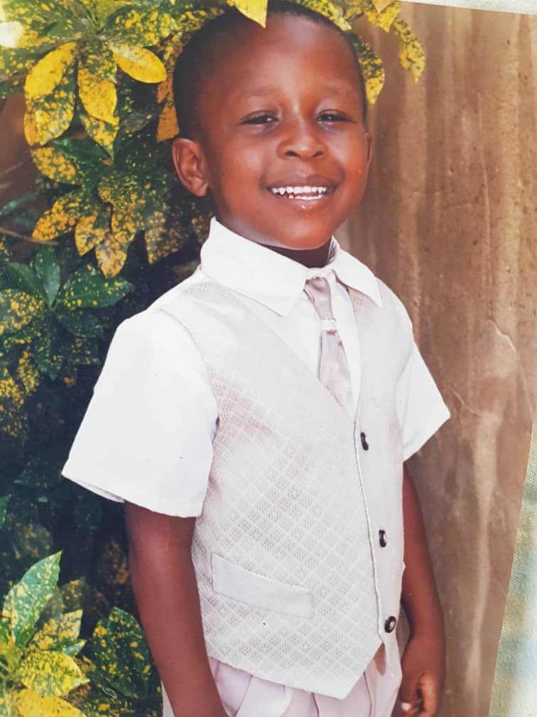 Ayoola as a young child in Nigeria